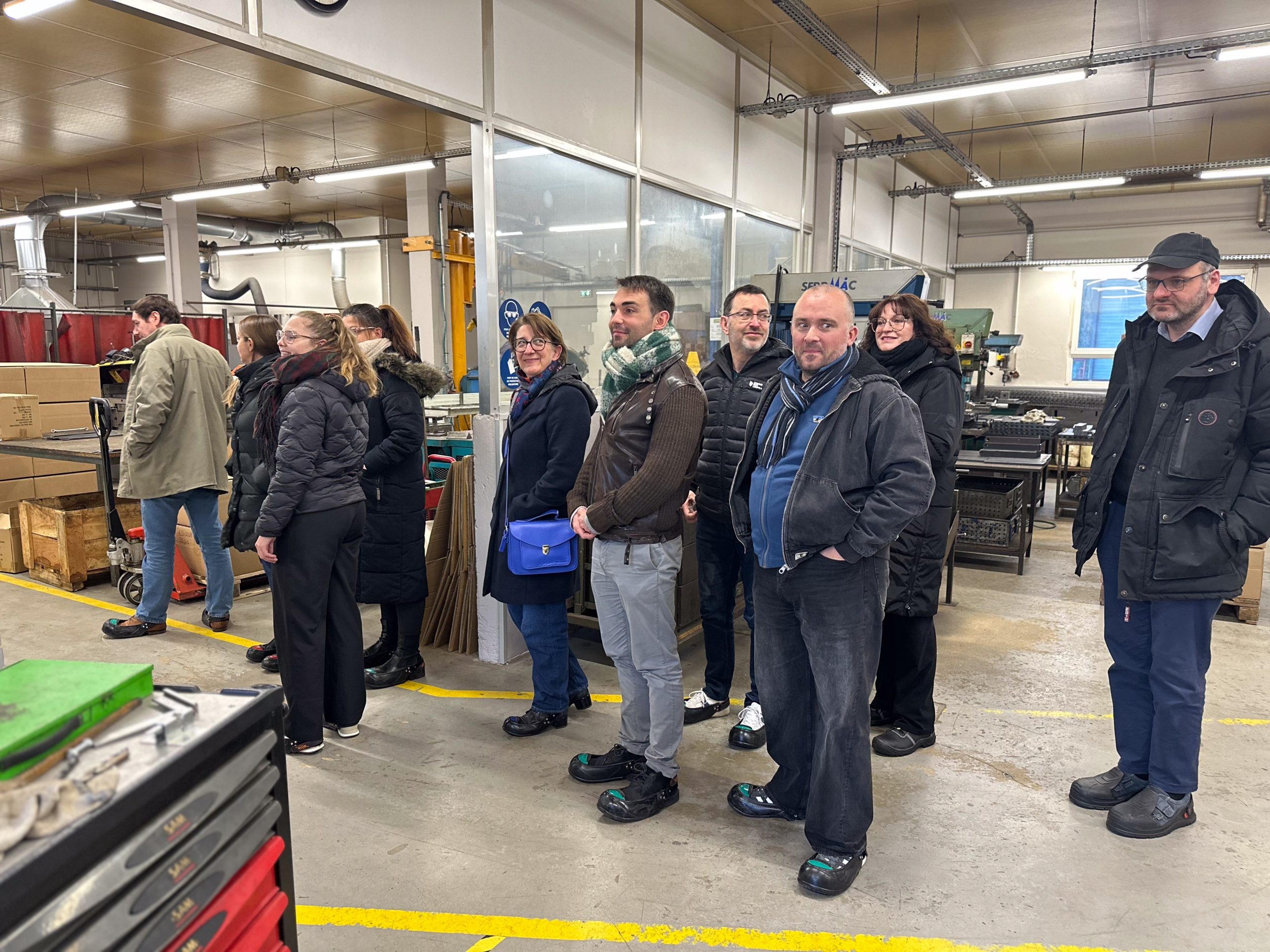 Photo de groupe lors de la visite du Crédit Mutuel aux Ateliers Sonnenhof